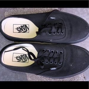 Black cloth Vans